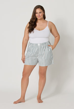 A lady wearing plus size Peppermint Stripe Woven Portuguese Flannel Boxer Short