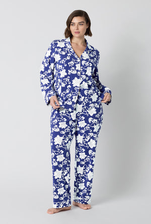 A Lady Wearing Plus Size Dynasty Blue Long Sleeve Classic Stretch Jersey Pj Set