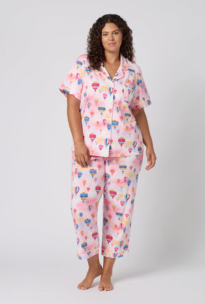 A Lady Wearing Plus Size Serene Sunrise Short Sleeve Classic Stretch Jersey Cropped Pj Set
