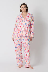 A Lady Wearing Plus Size Serene Sunrise Long Sleeve Classic Stretch Jersey Pj Set