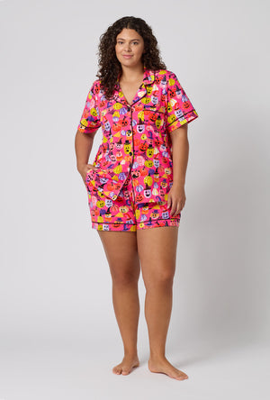 A Lady Wearing Plus Size Pumpkin Patch Party Short Sleeve Classic Shorty Stretch Jersey Pj Set