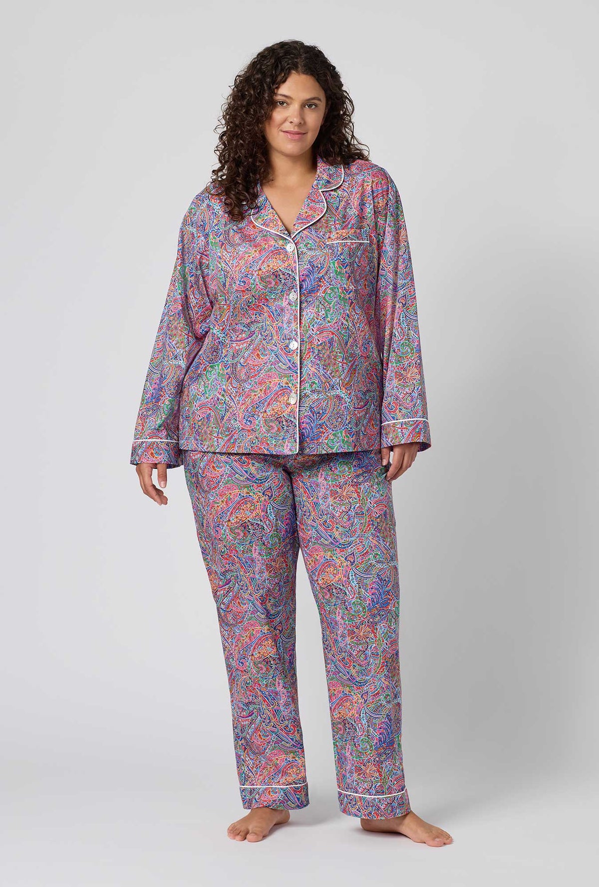 A Lady Wearing Plus Size Dana Sharmin Long Sleeve Classic Woven Tana Lawn® Pj Set Made With Liberty Fabrics
