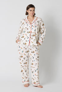 A Lady Wearing Plus Size Snoopy's Game Day Long Sleeve Classic Stretch Jersey Pj Set
