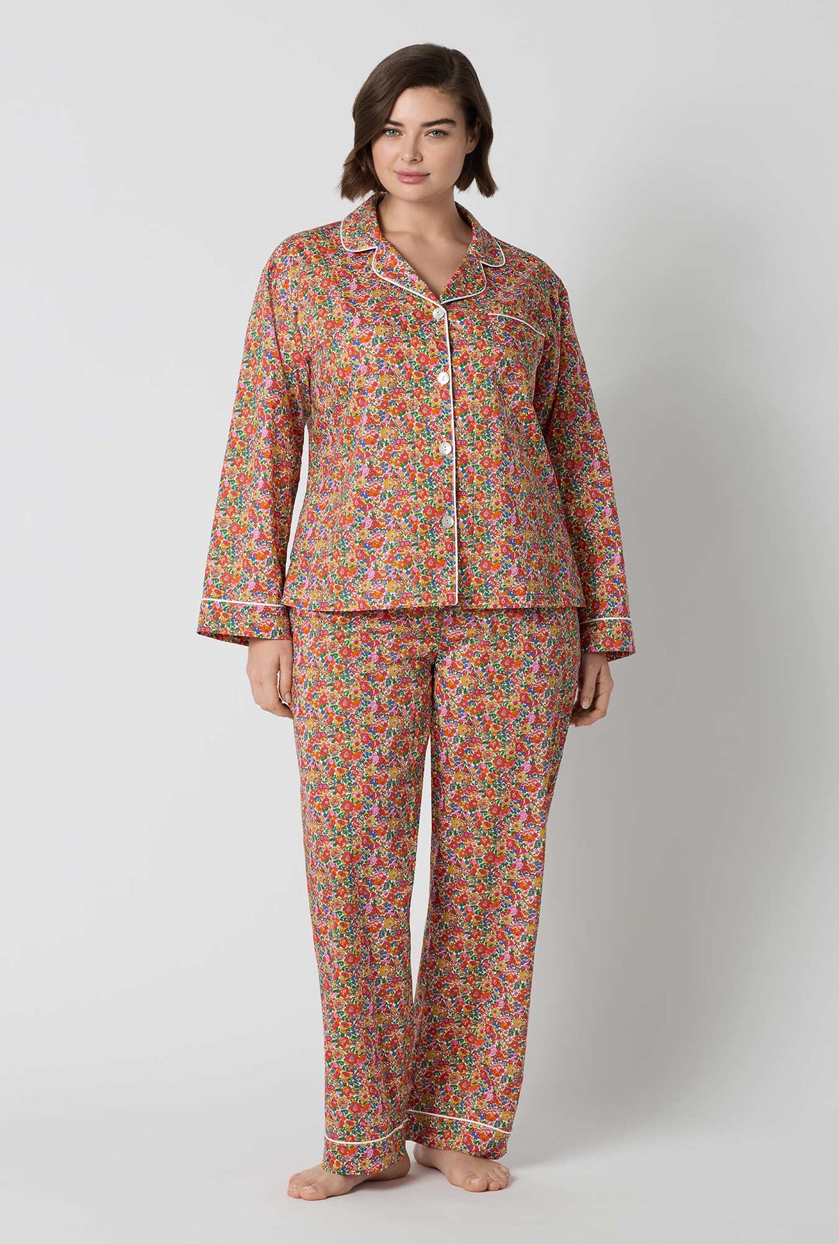 A Lady Wearing Plus Size Nell, Annie, & May Long Sleeve Classic Woven Tana Lawn® Pj Set Made With Liberty Fabrics
