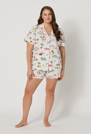 A lady wearing plus size Festive Flamingos Short Sleeve Classic Shorty Stretch Jersey Pj Set