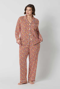 A lady wearing plus size Ditsy Harvest Long Sleeve Classic Stretch Jersey Pj Set