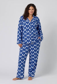A lady wearing plus size Owl Be Back Long Sleeve Classic Stretch Jersey Pj Set