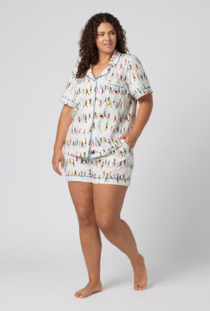 A lady wearing plus size Run NYC Run Short Sleeve Classic Shorty Stretch Jersey Pj Set