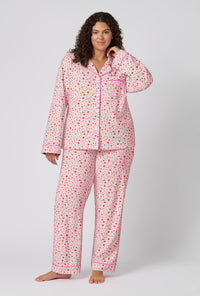 A lady wearing plus size Blushwood Long Sleeve Classic Woven Portuguese Flannel Pj Set