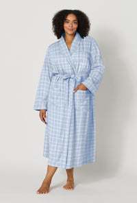 A lady wearing plus size Meadow Haze Plaid Unisex Classic Woven Portuguese Flannel Robe De Chambre