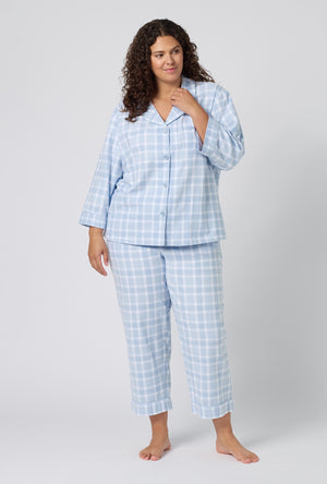 A lady wearing plus size Meadow Haze Plaid 3/4 Sleeve Classic Woven Portuguese Flannel Cropped Pj Set