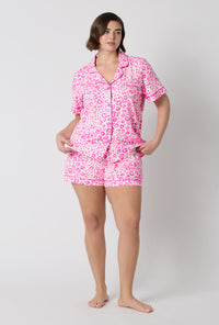A Lady Wearing Plus Size Valentina Leopard Short Sleeve Classic Shorty Stretch Jersey Pj Set
