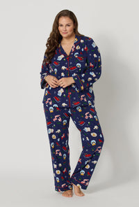 A lady wearing plus size Nordic Nights Long Sleeve Classic Stretch Jersey Pj Set