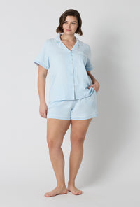 A lady wearing plus size Blissful Blue Short Sleeve Classic Shorty Stretch Jersey Pj Set