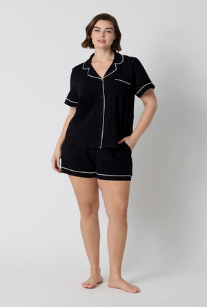 A lady wearing plus size Black Beauty Short Sleeve Classic Shorty Stretch Jersey Pj Set 