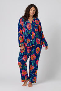 A Lady Wearing Plus Size BedHead x Trina Turk Linear Poppy Long Sleeve Classic Stretch Jersey Pj Set