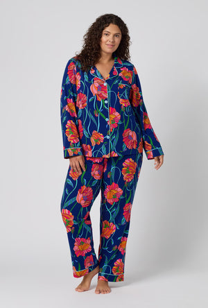 A Lady Wearing Plus Size BedHead x Trina Turk Linear Poppy Long Sleeve Classic Stretch Jersey Pj Set