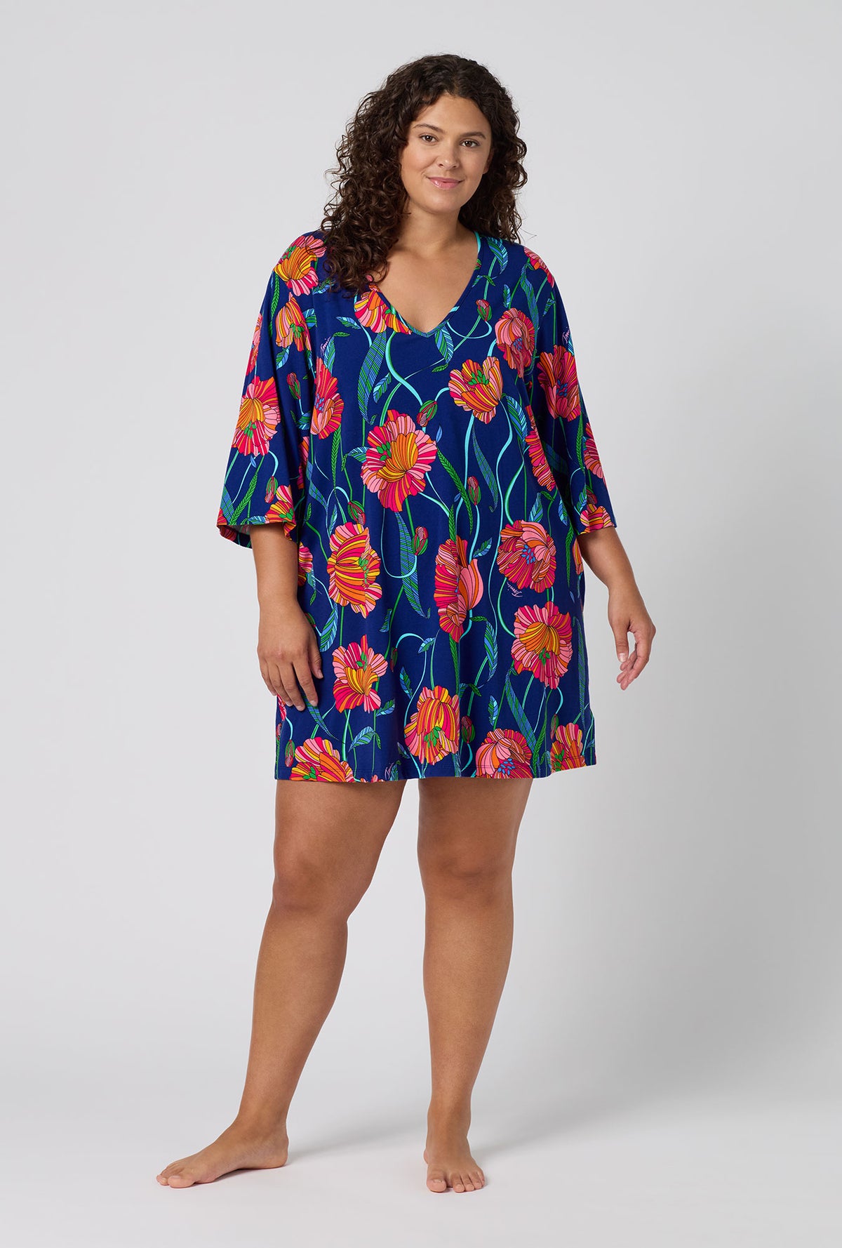 A Lady Wearing Plus Size BedHead x Trina Turk Linear Poppy Stretch Jersey Sleep Dress