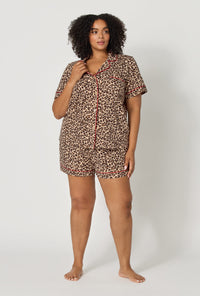 A lady wearing plus size Wild At Heart Short Sleeve Classic Shorty Stretch Jersey Pj Set