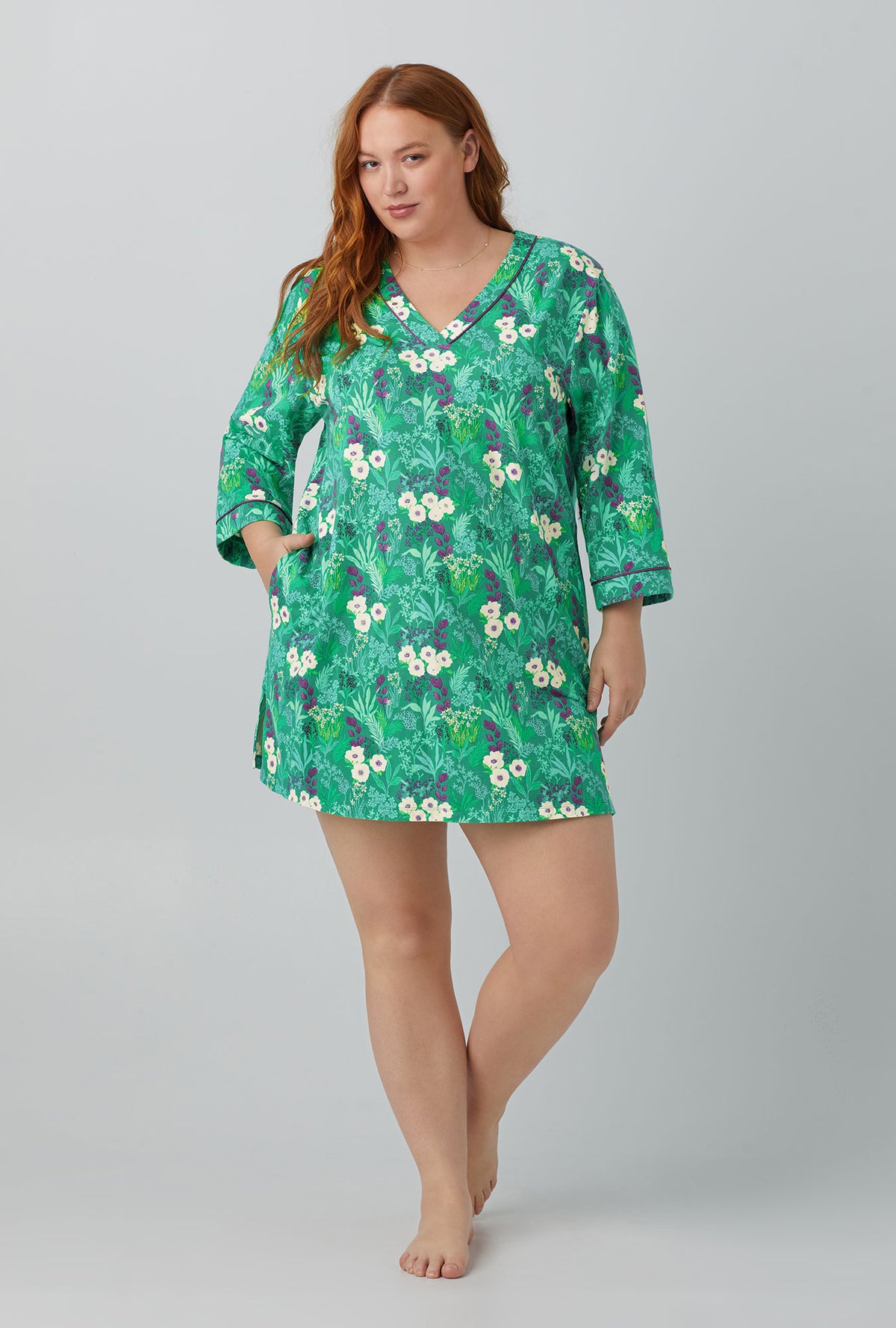 A lady wearing green 3/4 Sleeve Stretch Jersey Sleepshirt with Wintergreens print