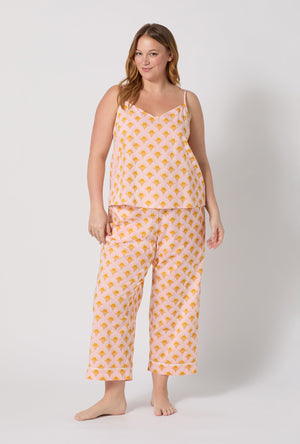 A Lady Wearing Plus Size Deco Sunset Cami Woven Cotton Poplin Cropped Pj Set facing front in a standing pose