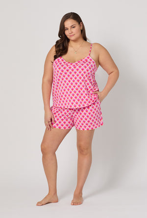 A lady wearing plus size BedHead x Trina Turk Scallop Cami Shorty Stretch Jersey Pj Set