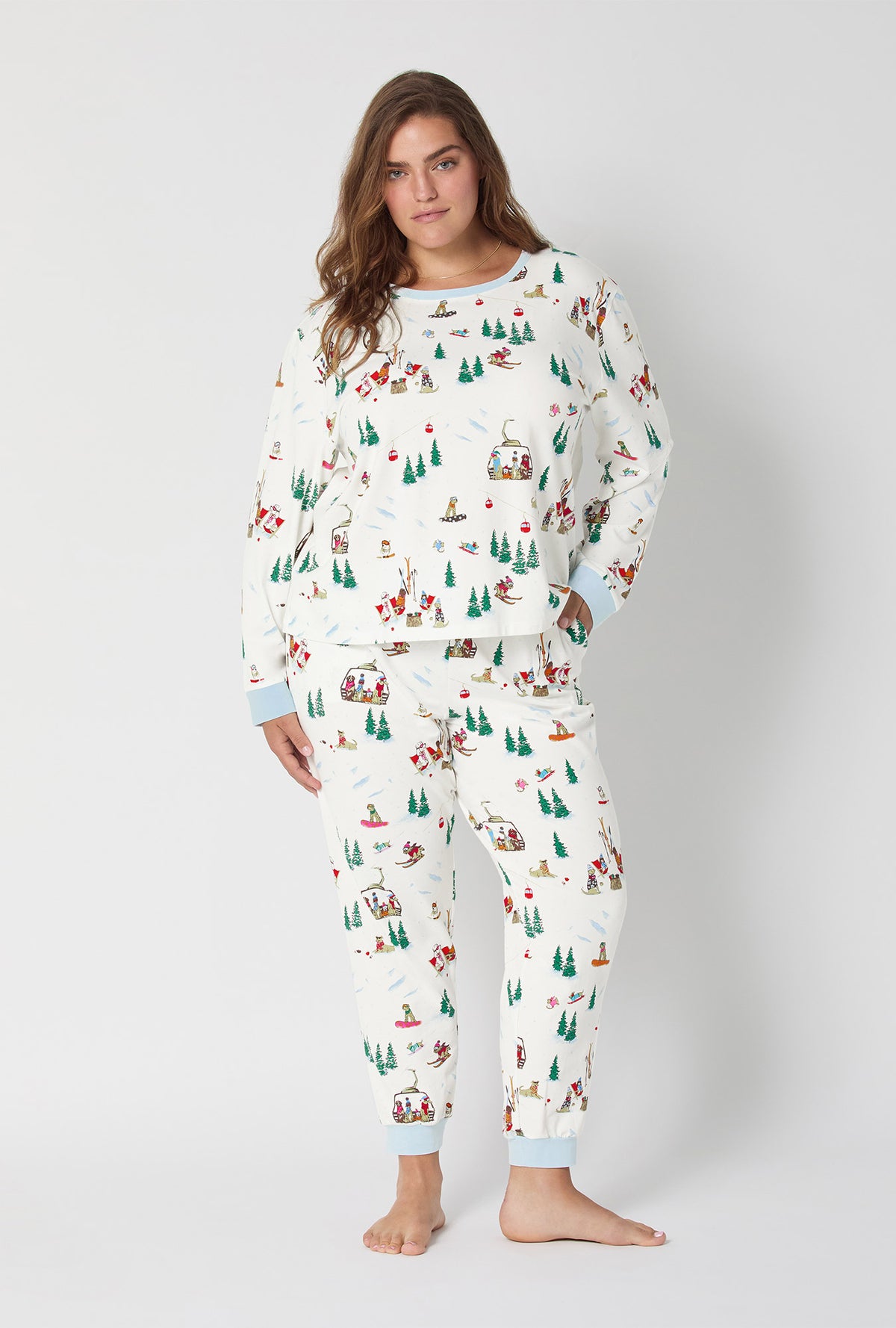 A lady wearing Ski Pups Long Sleeve Pullover Crew And Jogger Stretch Jersey Pj Set