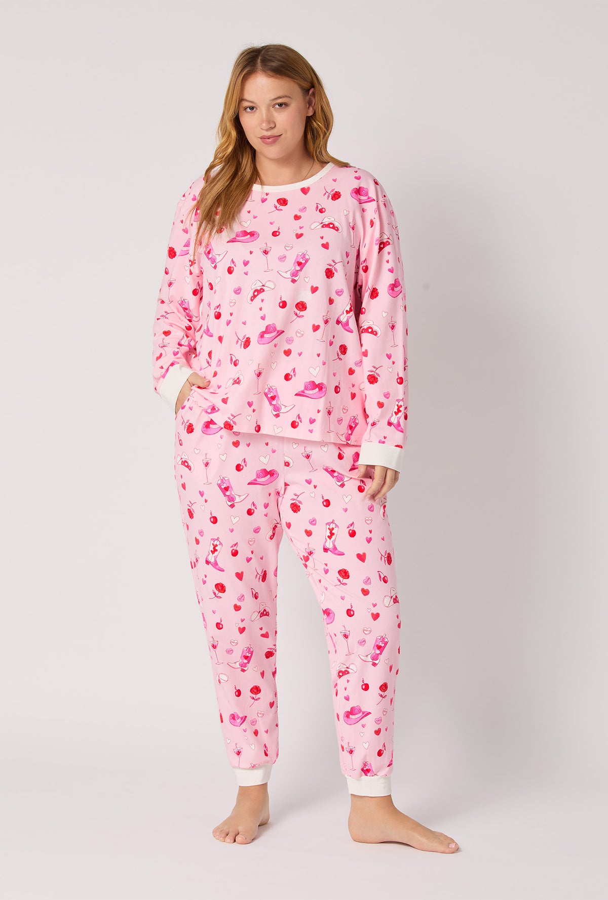 A lady wearing Giddy Up Galentine Long Sleeve Pullover Crew And Jogger Stretch Jersey Pj Set