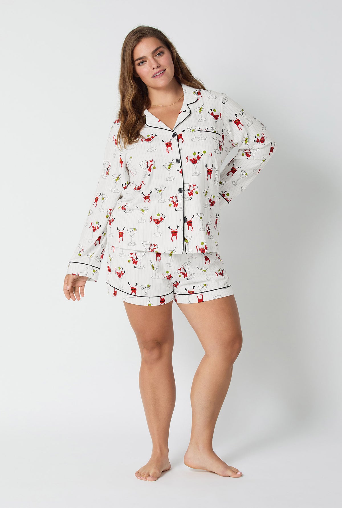 A lady wearing Tipsy Santa Long Sleeve Classic Stretch Jersey Shorty Pj Set