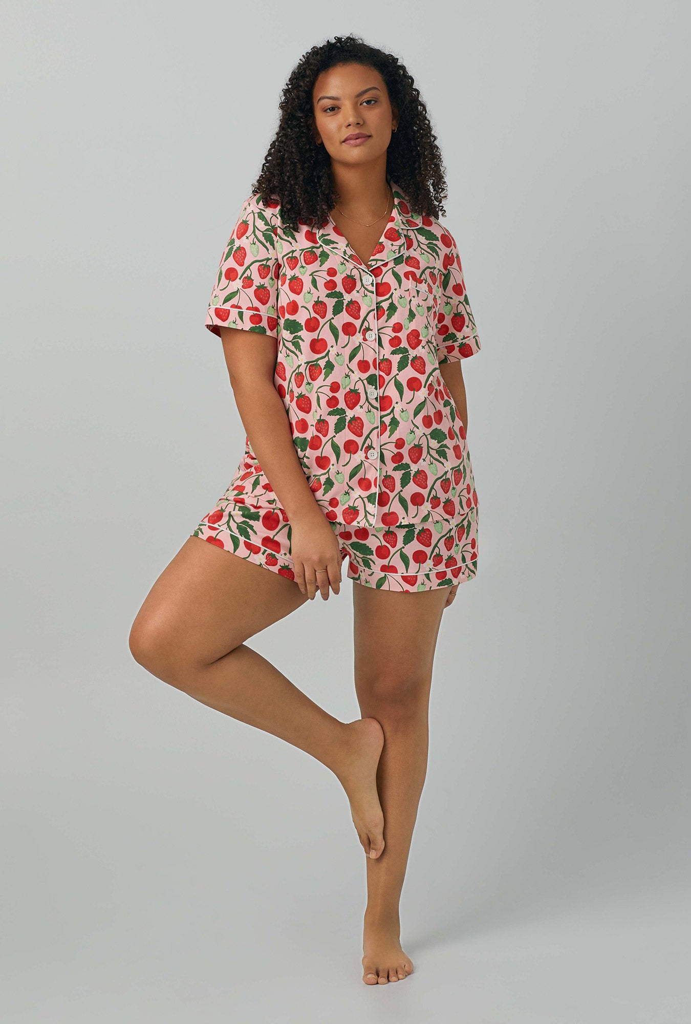 A lady wearing Short Sleeve Classic Shorty Stretch Jersey PJ Set with berry bliss print