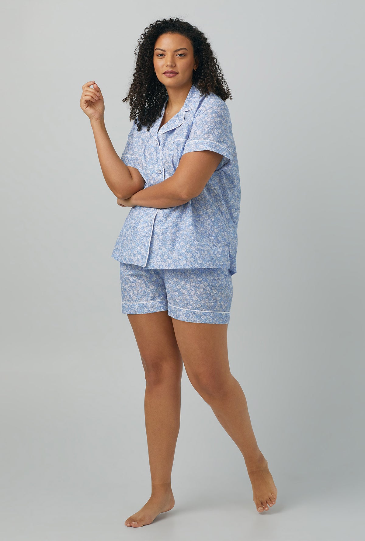 A lady wearing Short Sleeve Classic Woven Cotton Silk PJ Set with something blue print