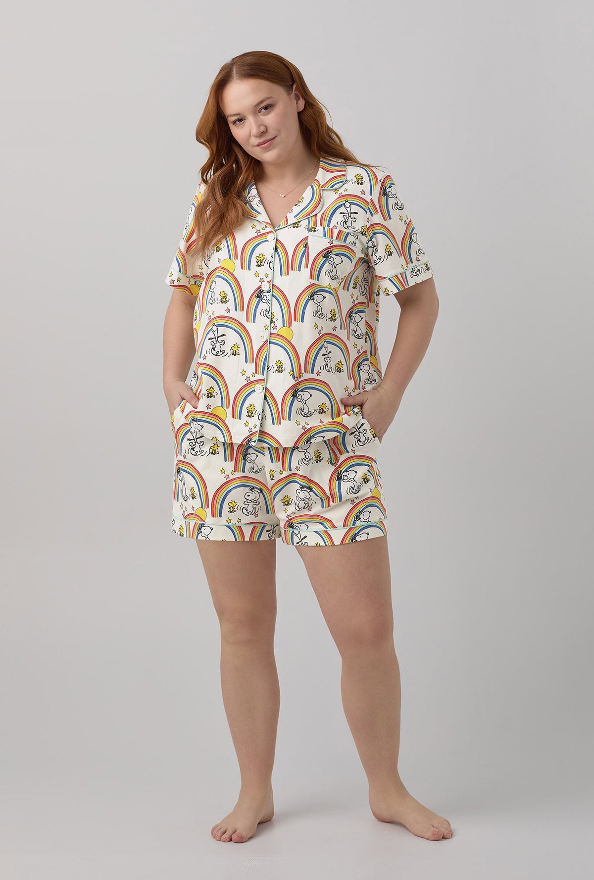 A lady wearing plus size white Short Sleeve Classic Shorty Stretch Jersey PJ Set with Sunshine Snoopy  print.