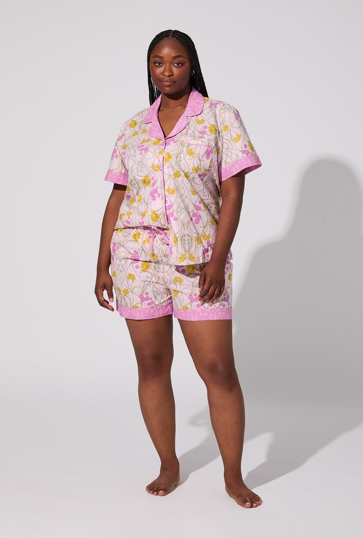 A lady wearing Fleur Nouveau Short Sleeve Classic Woven Cotton Poplin Shorty PJ Set