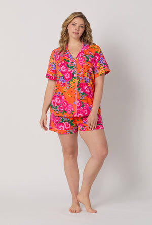 A lady wearing plus size Orange Short Sleeve Classic Shorty Stretch Jersey Pj Set front view