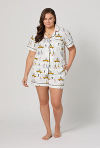 A lady wearing plus size Fashion Week Short Sleeve Classic Shorty Stretch Jersey Pj Set
