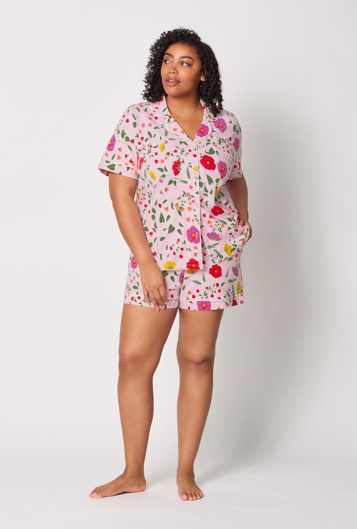 A lady wearing plus size Sunlit Floral Short Sleeve Classic Shorty Stretch Jersey Pj Set