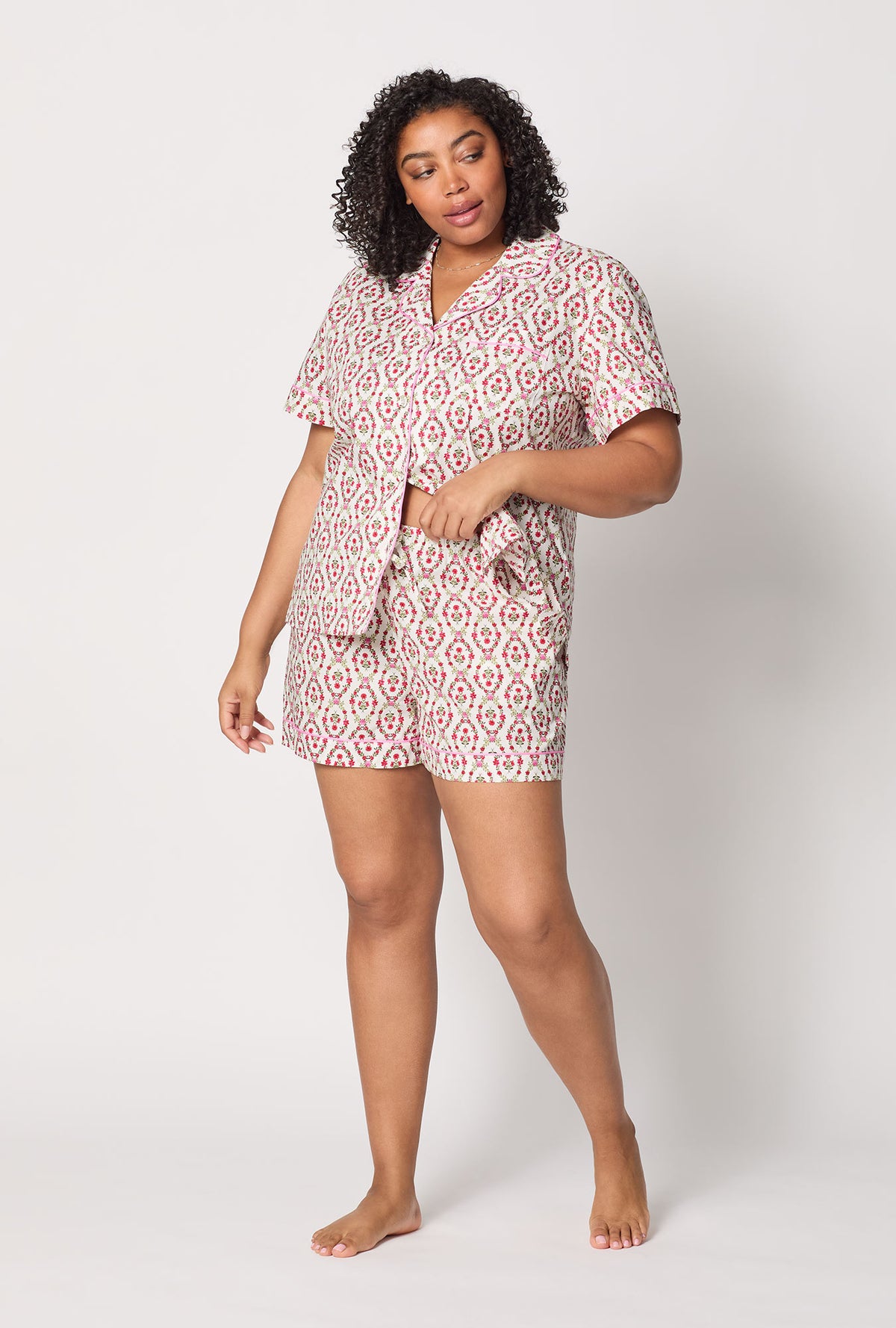 A lady wearing plus size Olivia Short Sleeve Classic Woven Cotton Poplin Shorty Pj Set