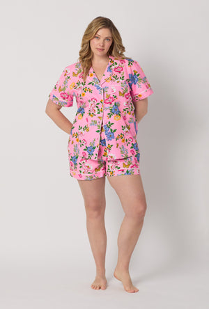A lady wearing plus size Pink Short Sleeve Classic Woven Cotton Poplin Shorty Pj Set front view