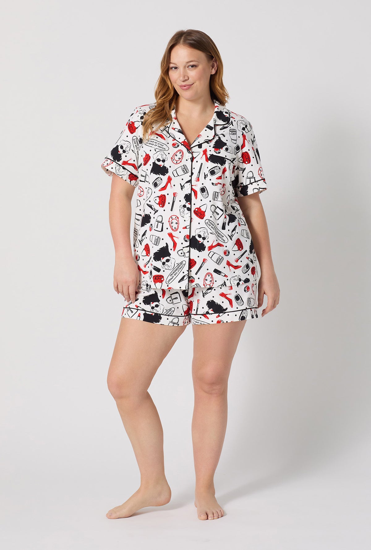 A lady wearing plus size Devil Wears Prada Short Sleeve Classic Shorty Stretch Jersey Pj Set 