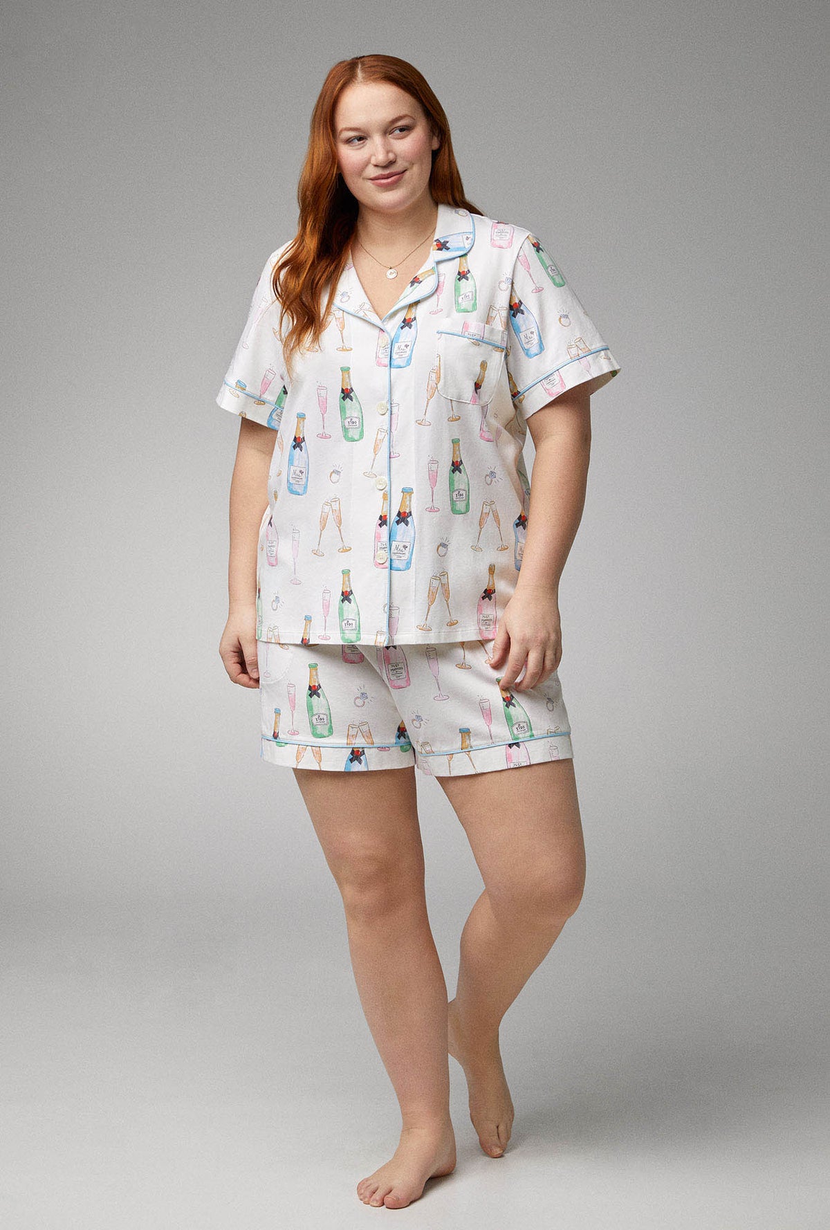 A lady wearing Short Sleeve Classic Shorty Stretch Jersey plus size PJ Set with Champagne Wedding print