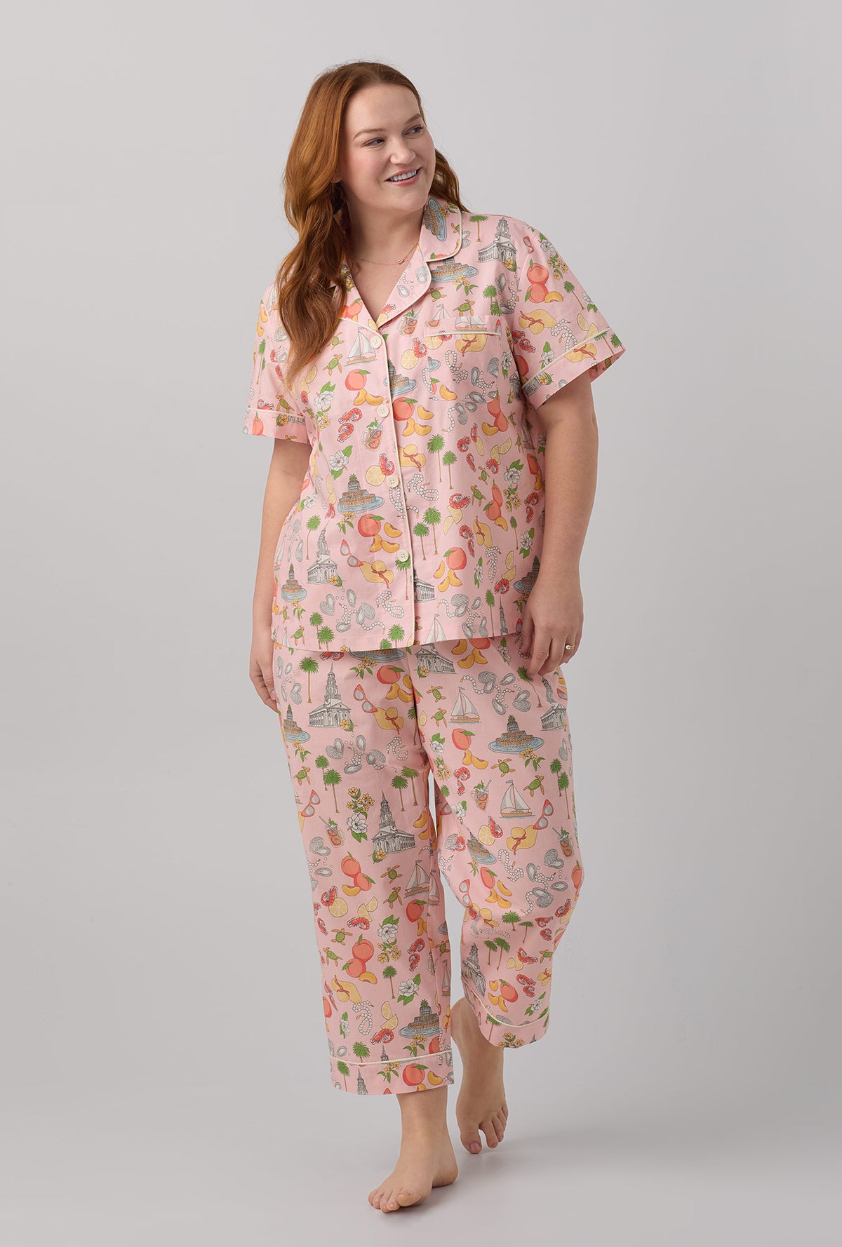 A lady wearing Short Sleeve Classic Woven Cotton Poplin Cropped PJ Set with charming charleston print