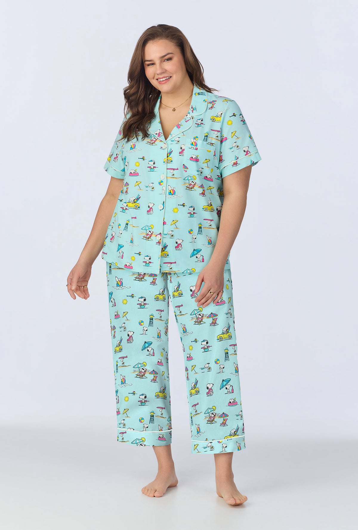 A lady wearing Surfside Snoopy® Short Sleeve Classic Cropped Stretch Jersey PJ Set