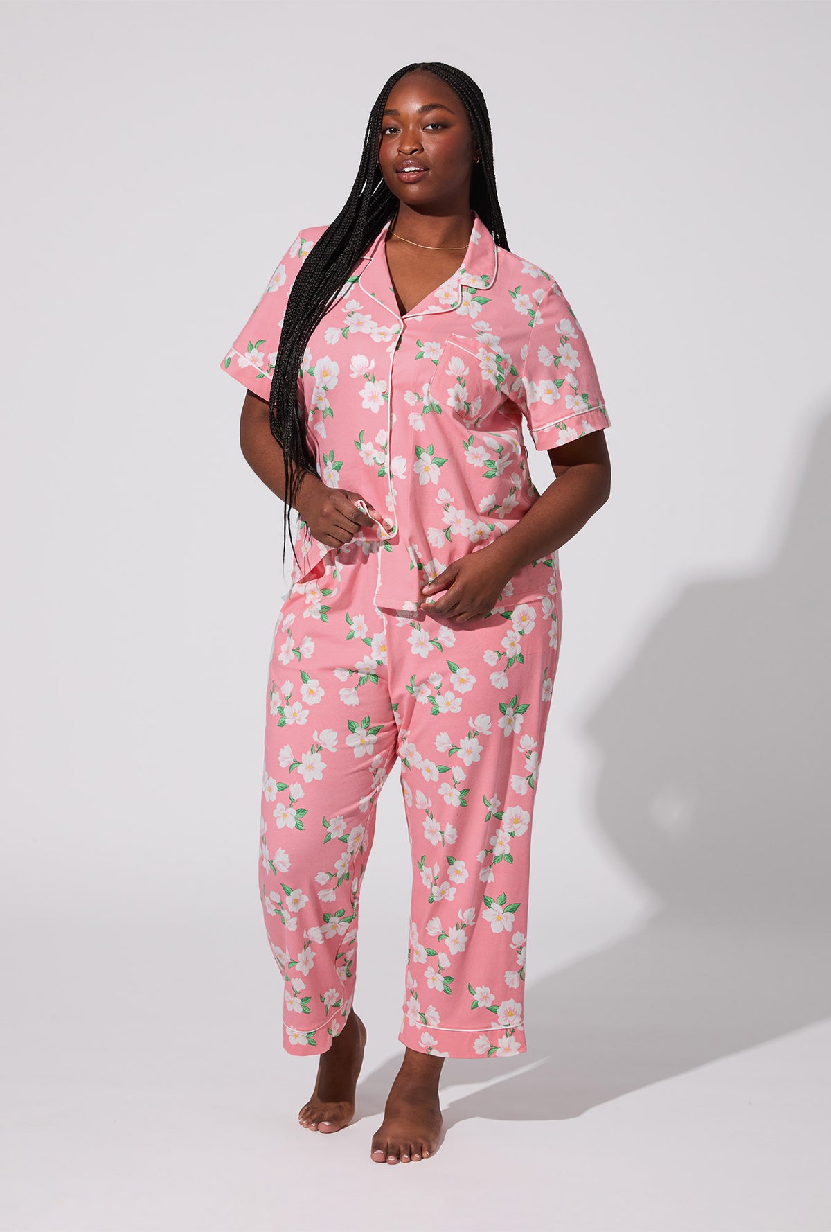 A lady wearing Pink Magnolias Short Sleeve Classic Stretch Jersey Cropped PJ Set