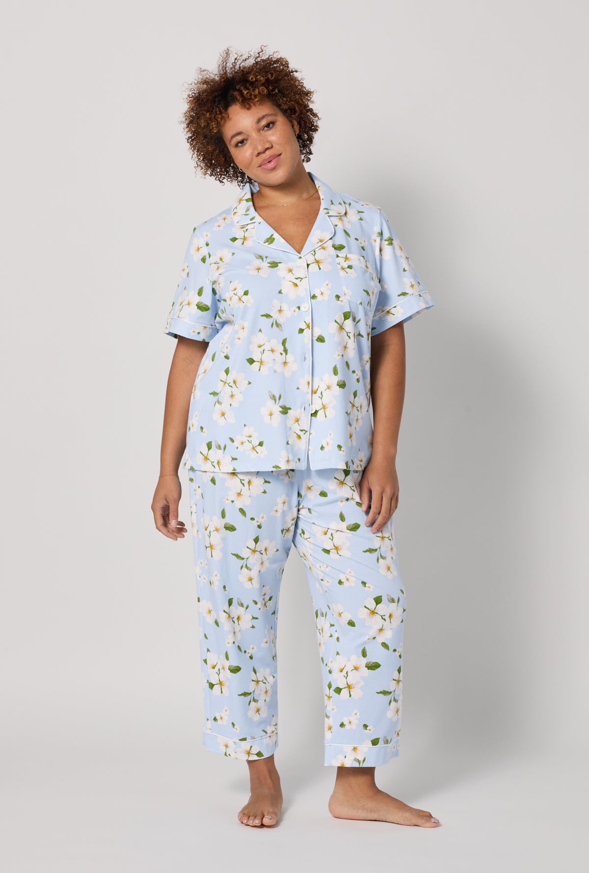 A lady wearing plus Magnolia Breeze Short Sleeve Classic Stretch Jersey Cropped Pj Set