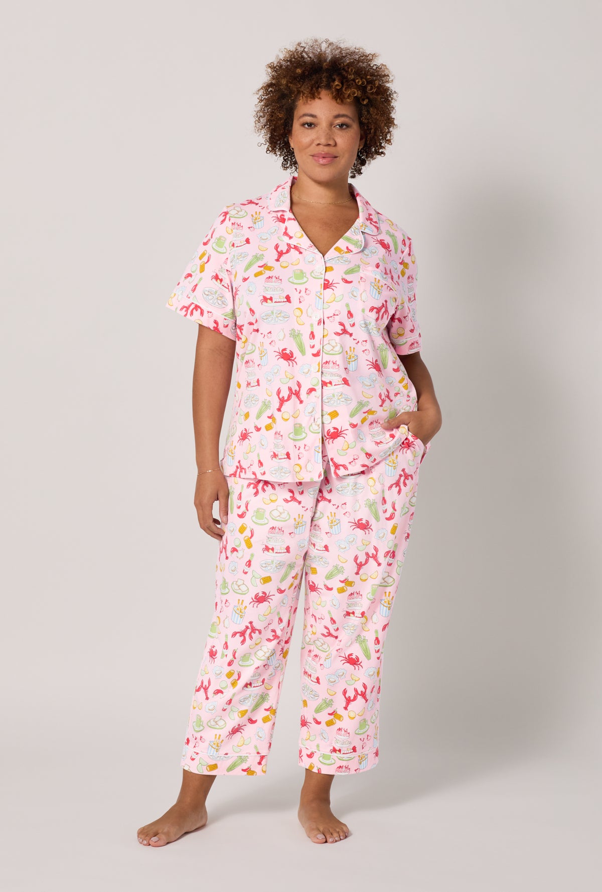 A lady wearing plus size French Quarter Short Sleeve Classic Stretch Jersey Cropped Pj Set