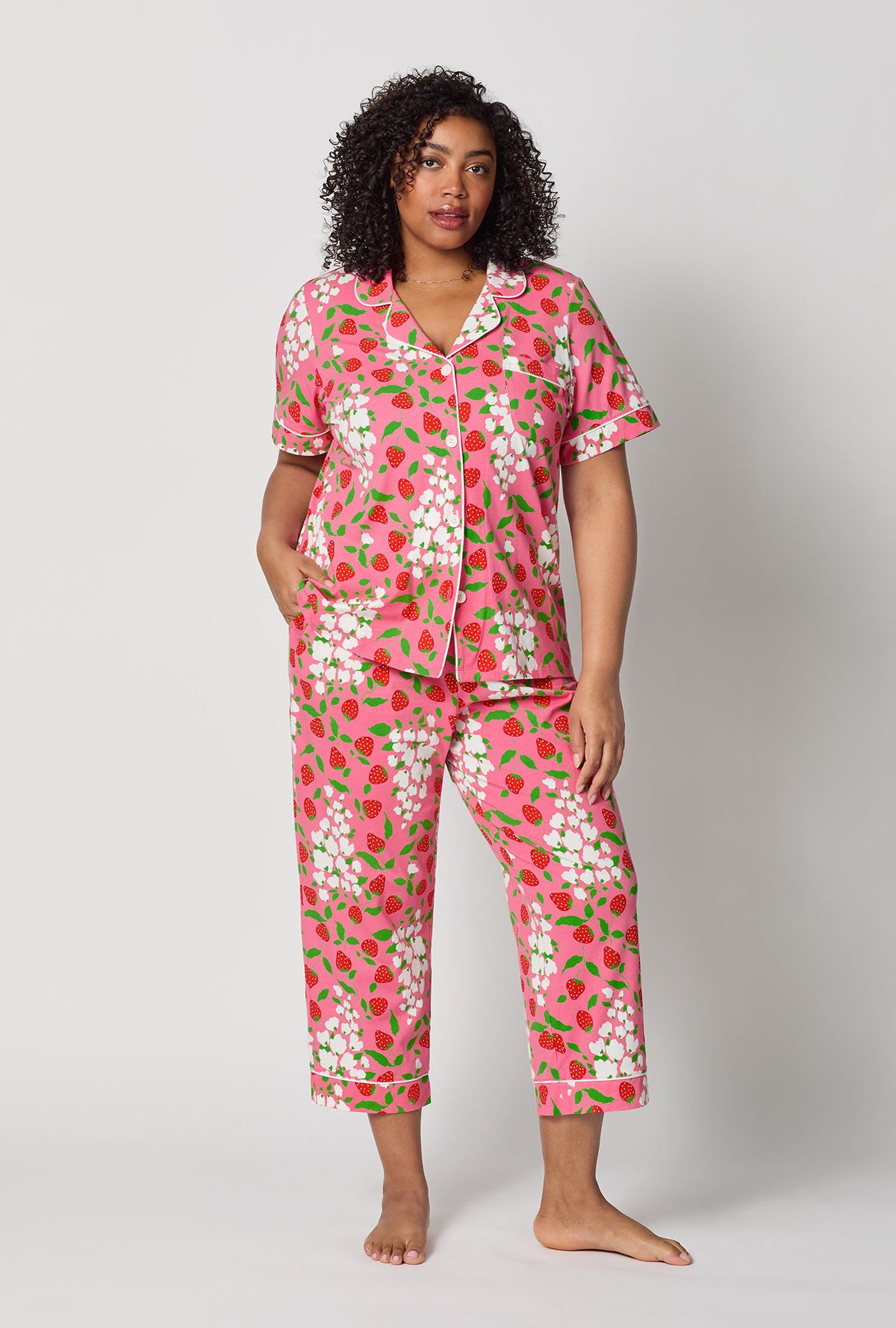 A lady wearing plus size Spring Berry Short Sleeve Classic Stretch Jersey Cropped Pj Set