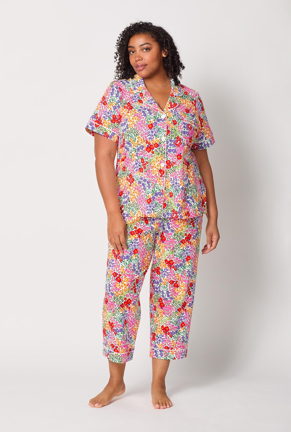 A lady wearing plus size Spring Fields Short Sleeve Classic Stretch Jersey Cropped Pj Set
