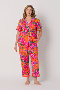 A lady wearing plus size Orange Short Sleeve Classic Stretch Jersey Cropped Pj Set front view