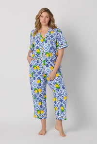 A lady wearing plus size Blue and  White Short Sleeve Classic Stretch Jersey Cropped Pj Set front view