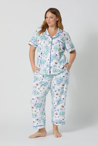 A lady wearing plus size Treasure Hunt Short Sleeve Classic Stretch Jersey Cropped Pj Set 